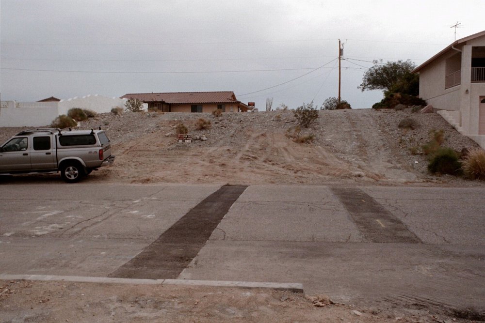 Image of empty lot before house.