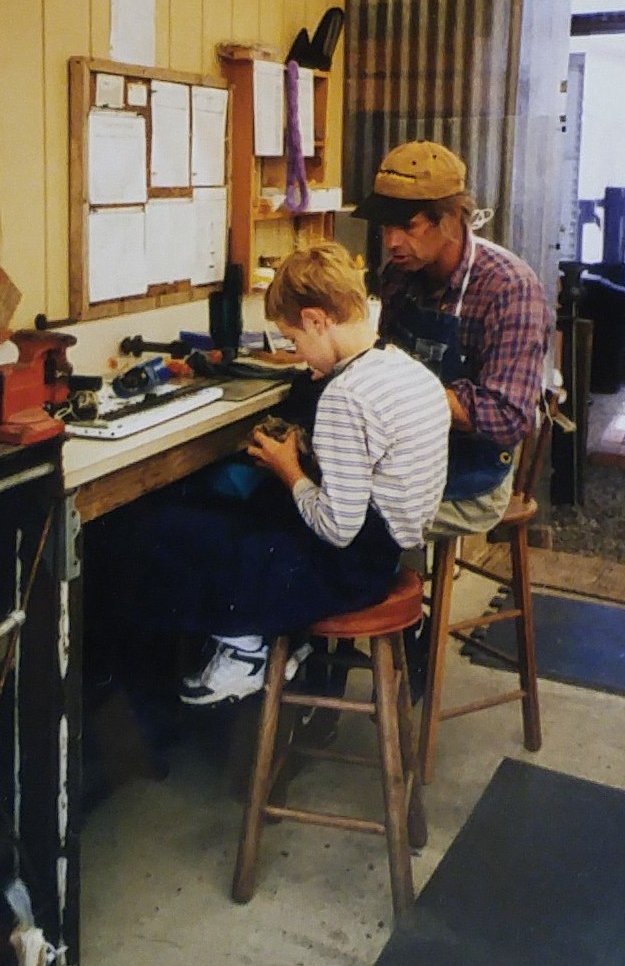 Image of Roger being tutored by a mechanical engineer when he was roughly 11.